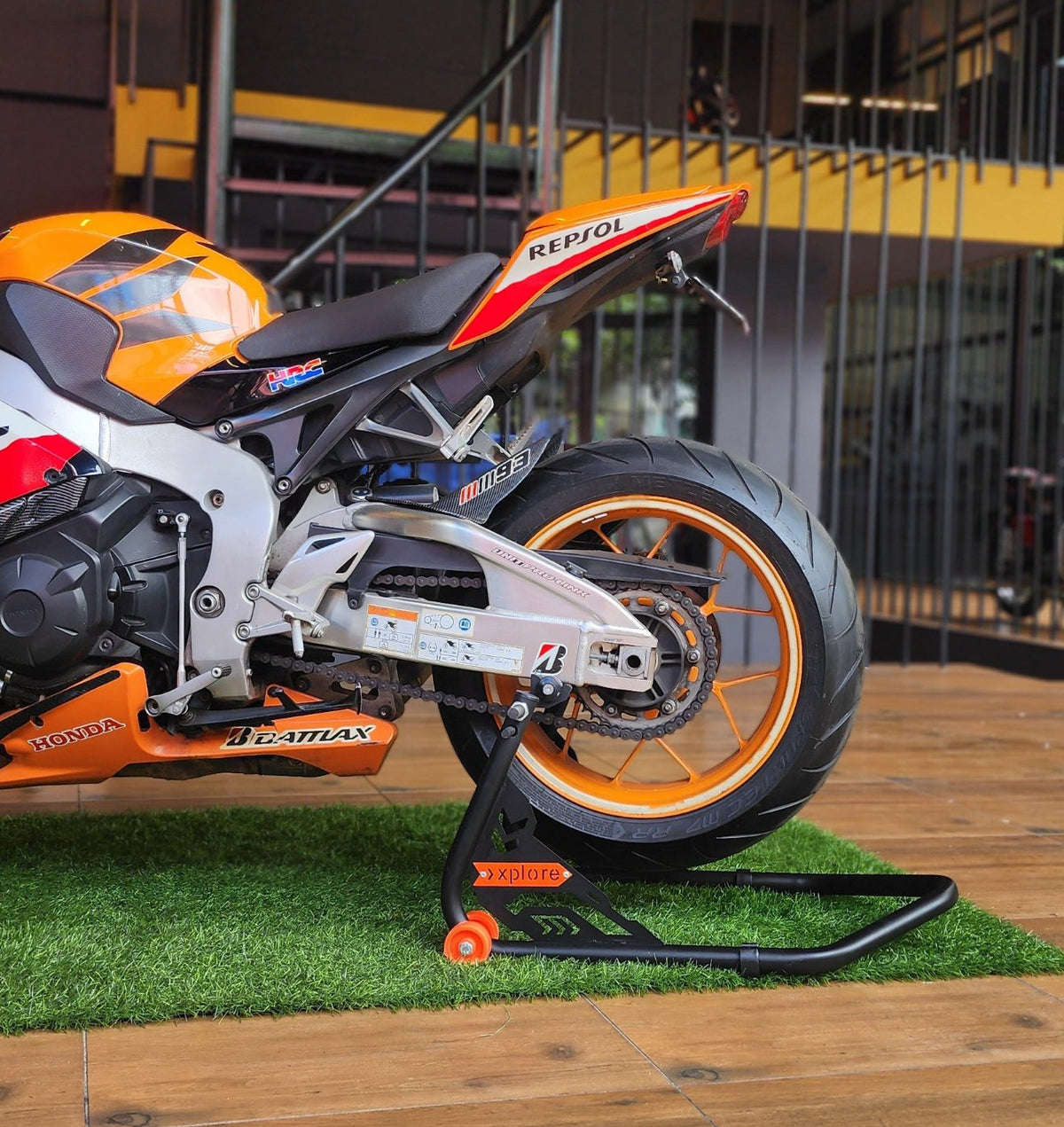 Explore Marvel Edition bike paddock stand with spool and swingarm lift holders, designed for motorcycle maintenance and stability.