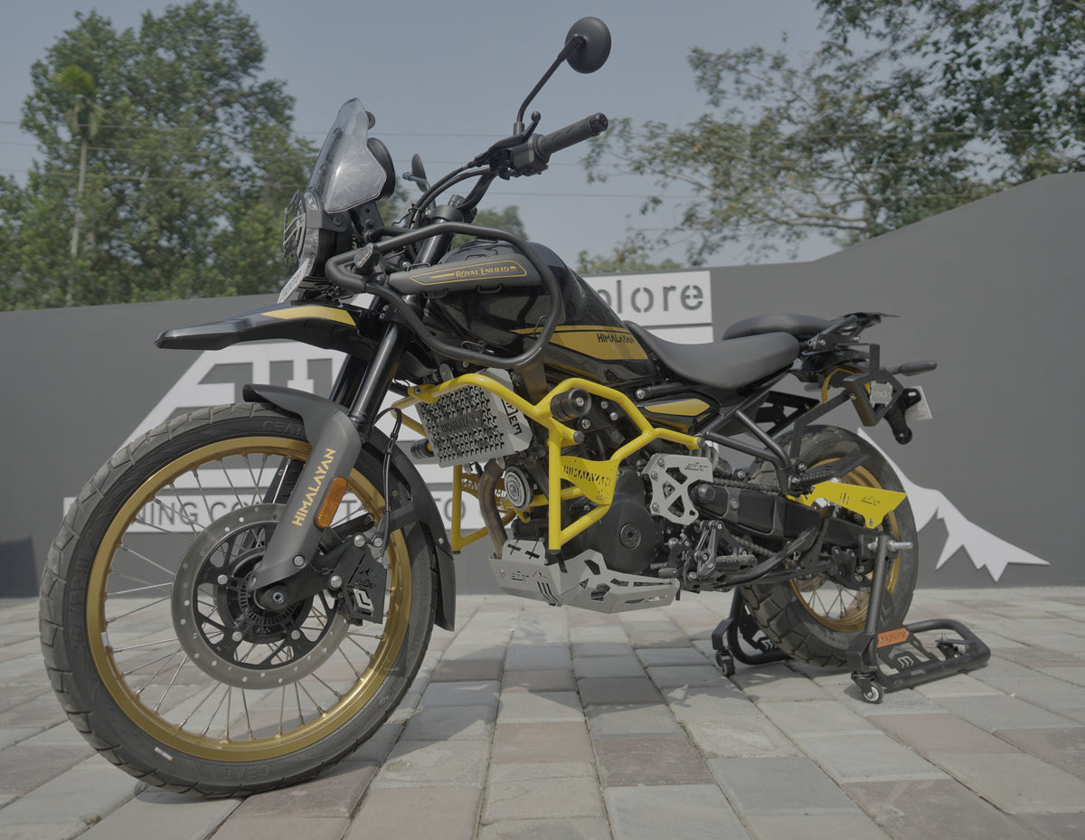 Jorjem Trail edition crash guard for Himalayan 450, showcasing durable design and protective features in a rugged outdoor setting.