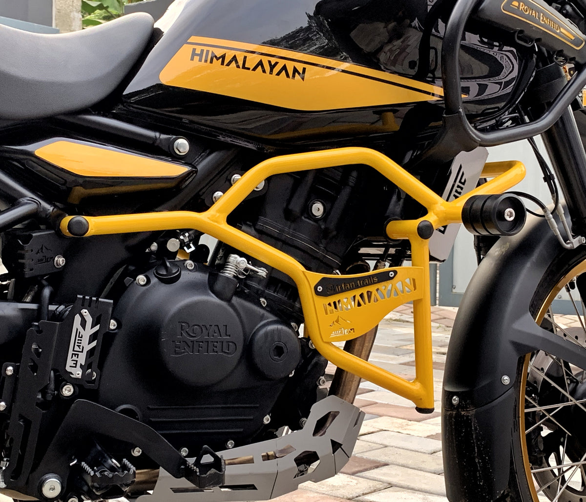 Jorjem Trail edition crash guard for Himalayan 450, showcasing robust design and durable construction in outdoor setting.