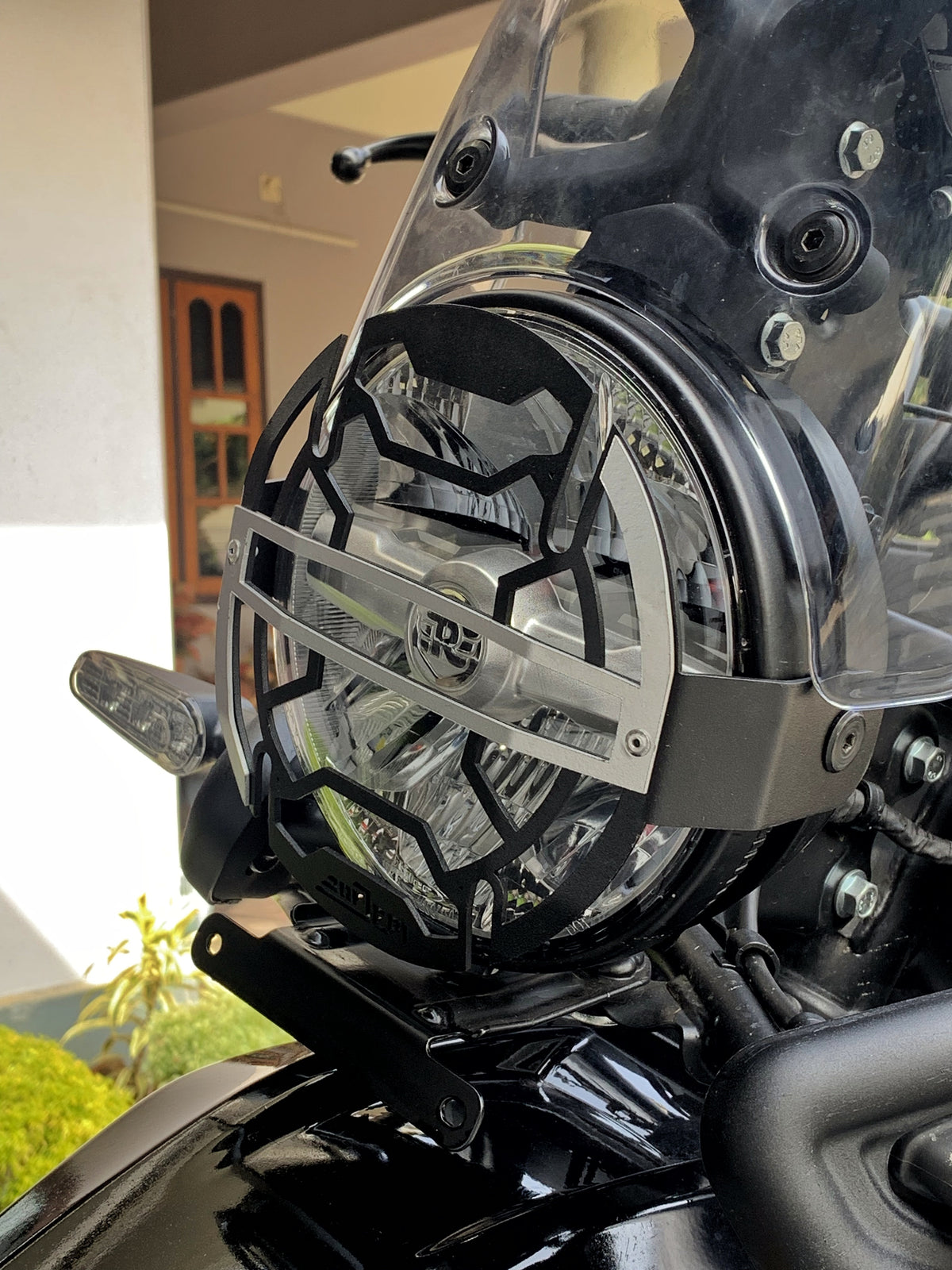 re himalayan 450 headlight guard 