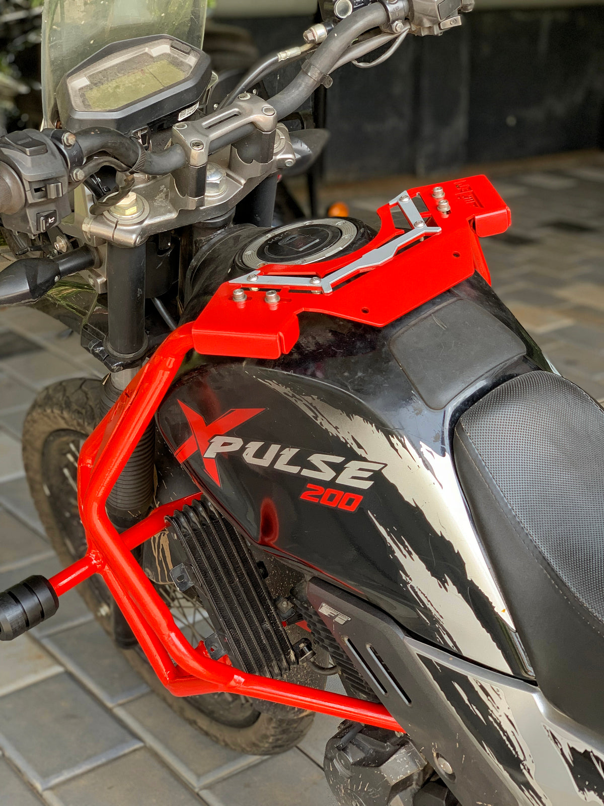 Jorjem Xpulse 200 custom trail edition crash guard mounted on a motorcycle, showcasing robust design and protective features.