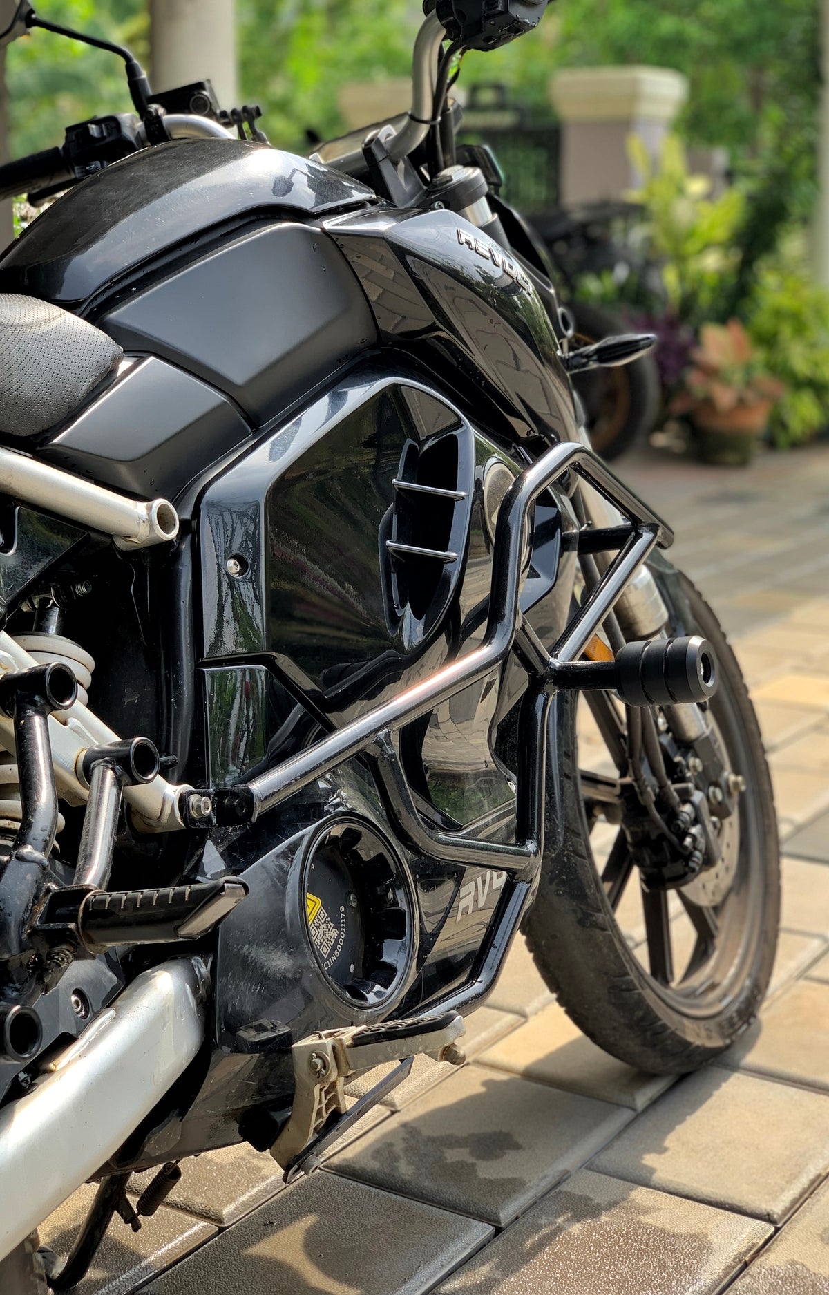 Jorjem Revolt RV 400 crash guard with sliders, showcasing robust design and protective features for motorcycle safety.