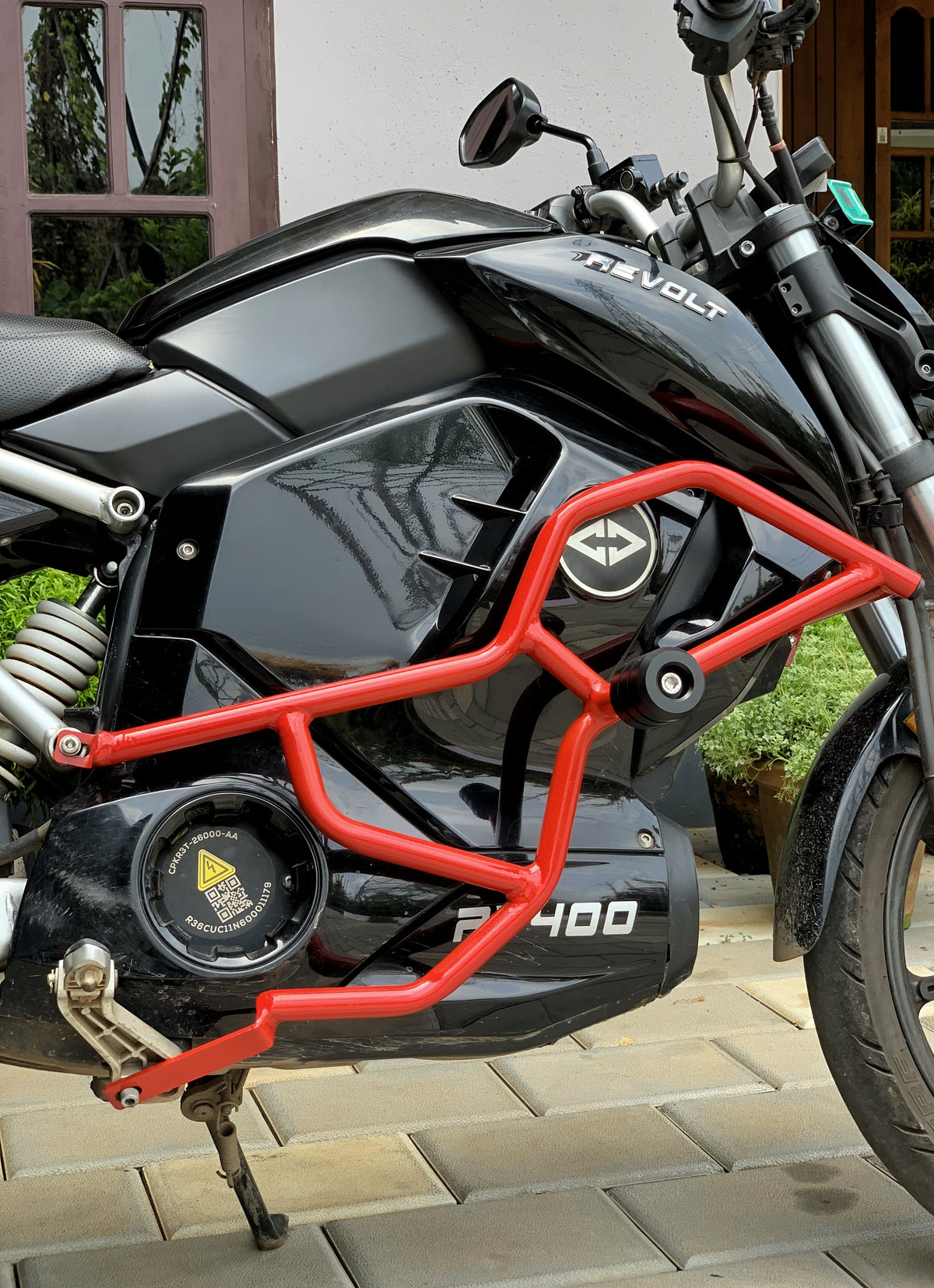 Jorjem Revolt RV 400 crash guard with sliders, showcasing durable construction and sleek design for motorcycle protection.