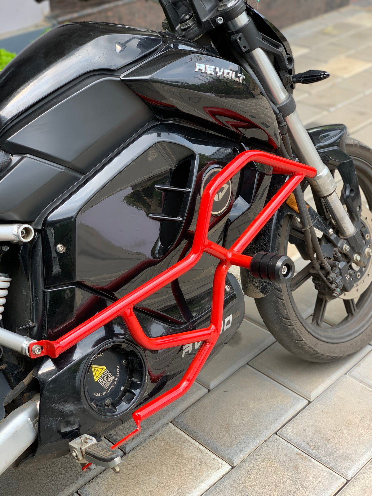 Jorjem Revolt RV 400 crash guard with sliders, showcasing robust design and durable materials for motorcycle protection.