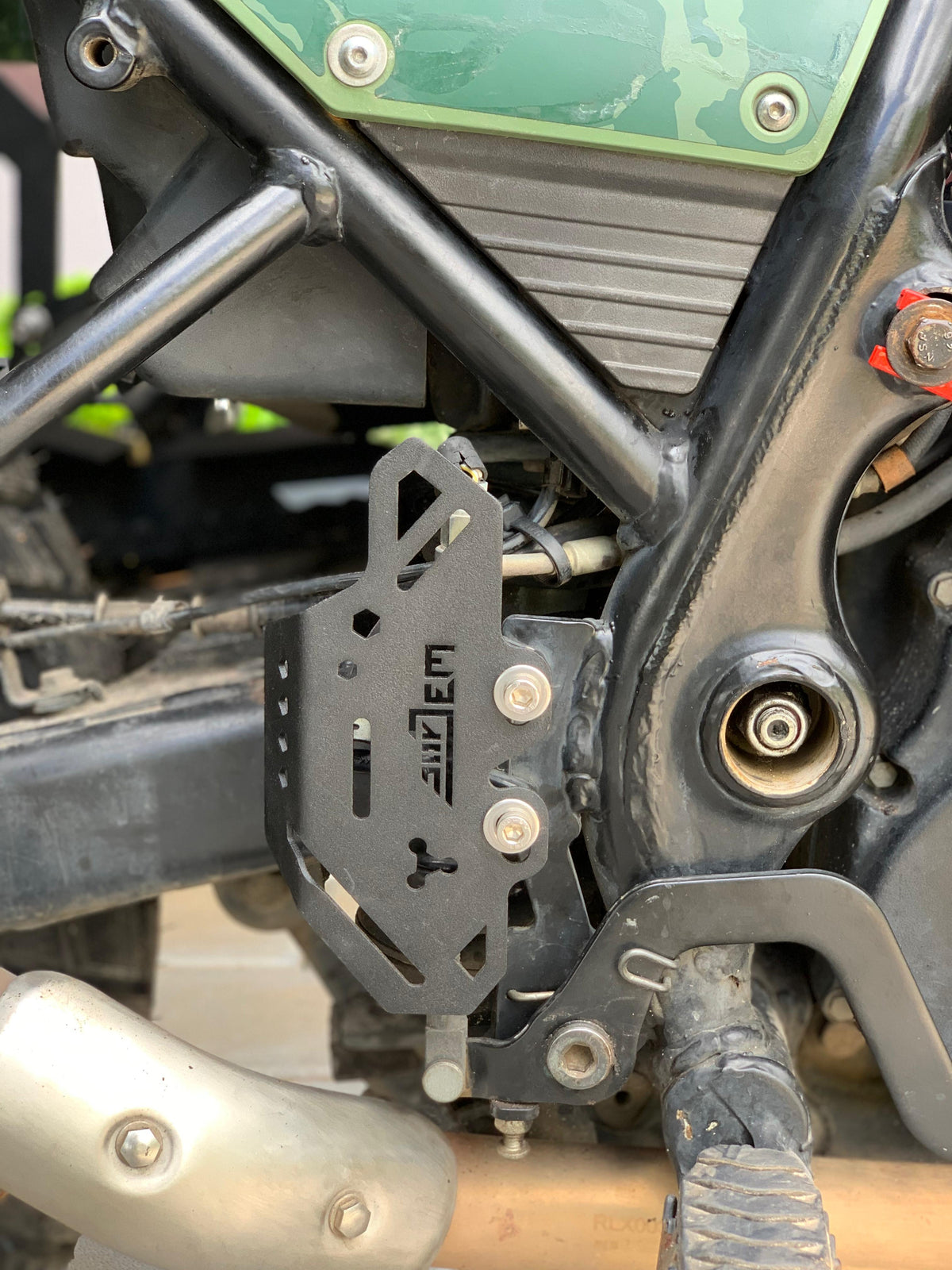 Master cylinder guard for Himalayan 411 by Jorjem International, showing durable design and protective features.