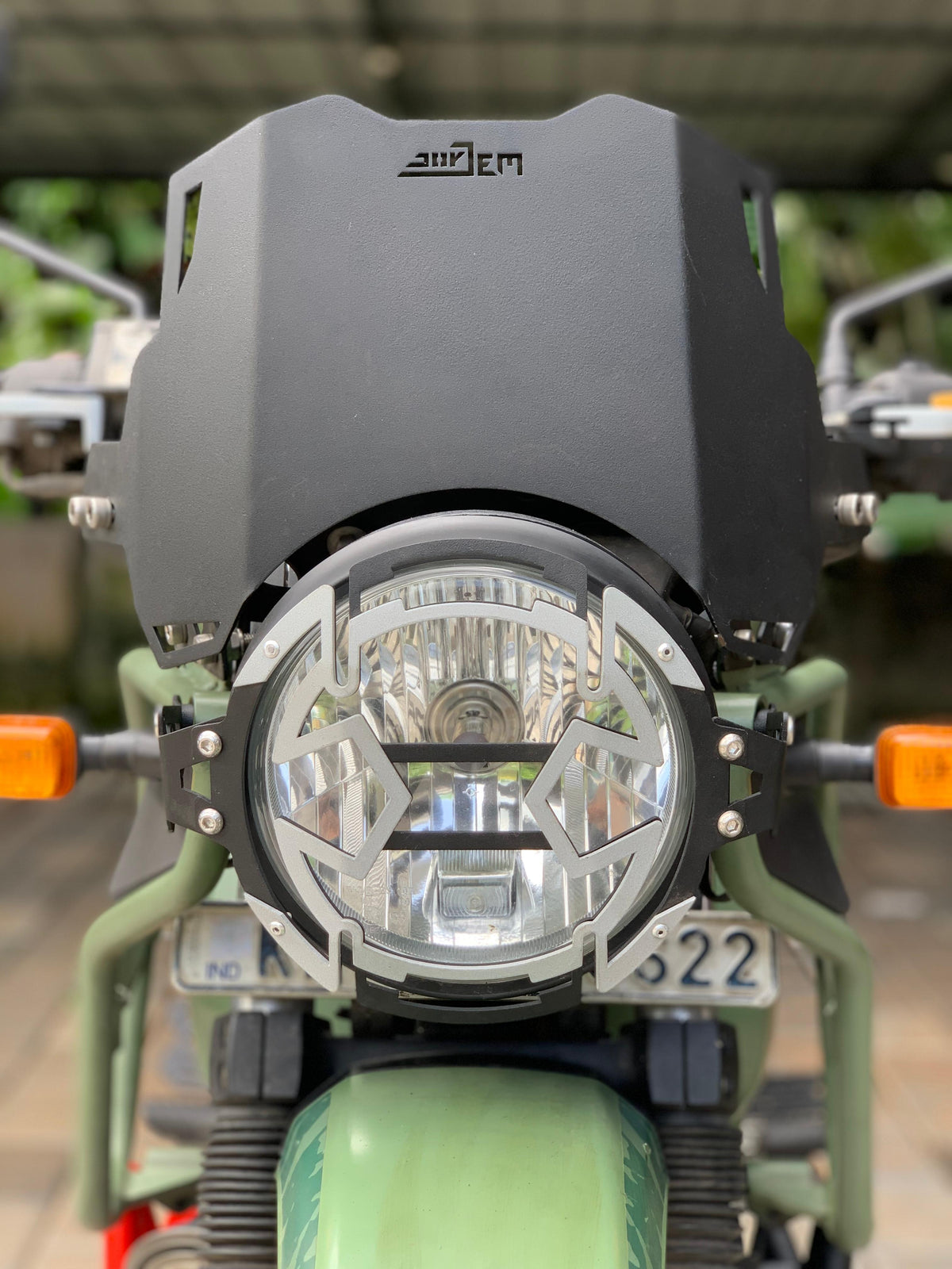 Shiny metallic visor designed for Himalayan 411 motorcycle helmet by Jorjem International Pvt Ltd, shown from the front angle.