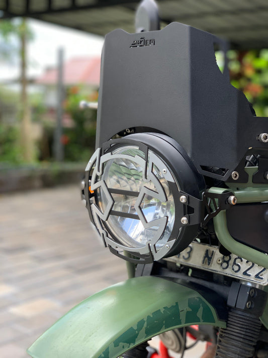 Himalayan 411 headlight grill by Jorjem International Pvt Ltd, showing a black metal front grille for vehicle headlights.