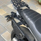 Triumph Speed 400 luggage carrier by Jorjem International, showcasing sturdy design and mounting features for motorcycles.