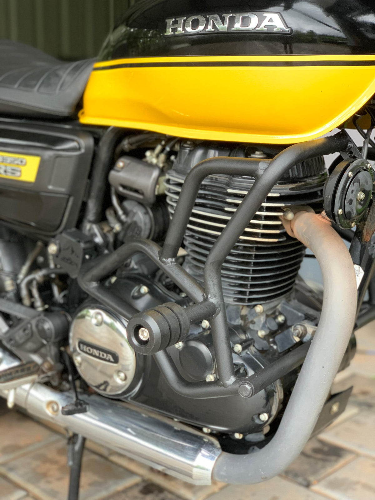 Jorjem CB350RS crash guard by Explore Manufactures, showcasing a robust design for motorcycle protection.