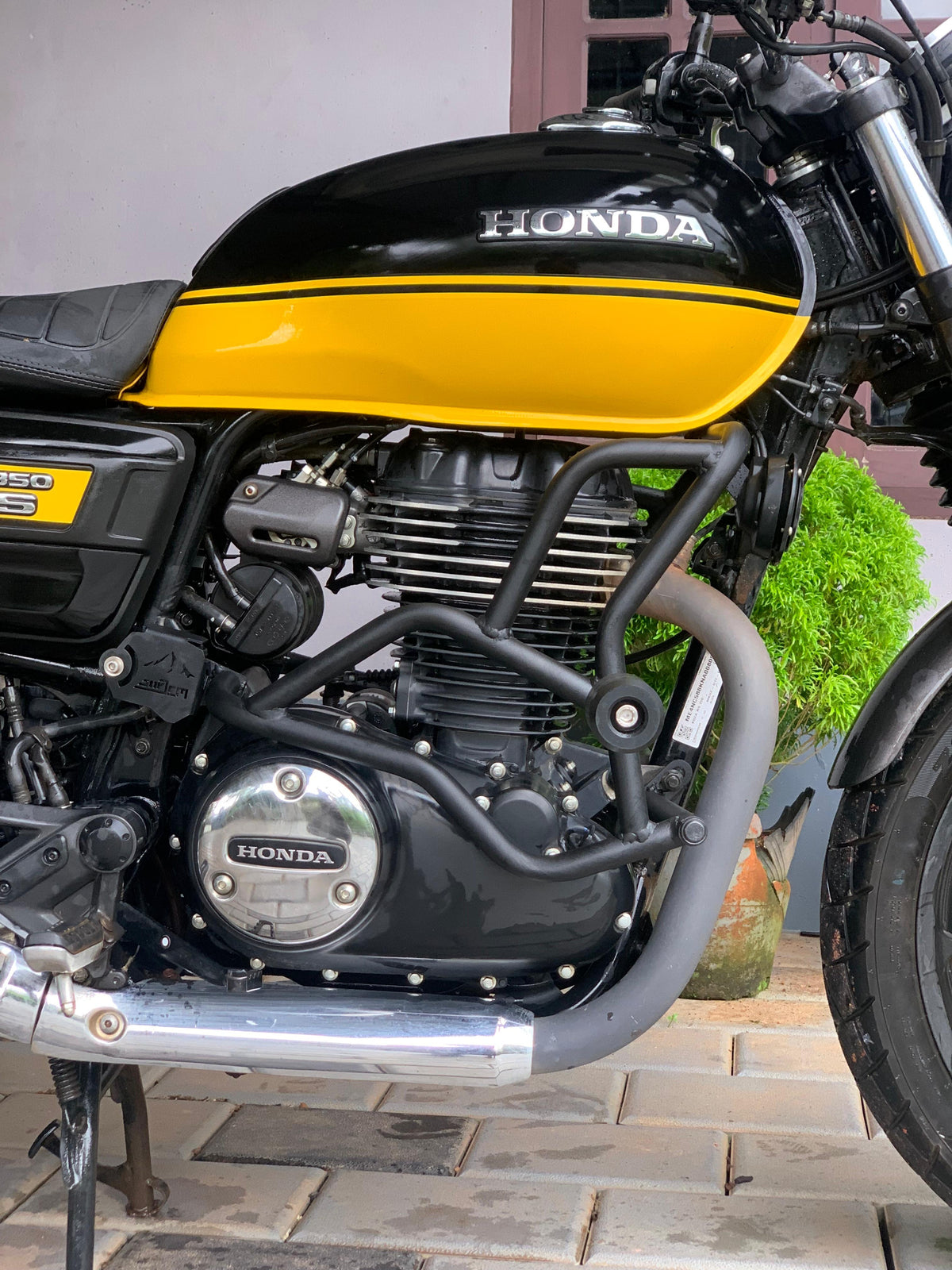 Jorjem CB350RS crash guard by Explore Manufactures, showcasing sturdy metal design and protective features for motorcycles.
